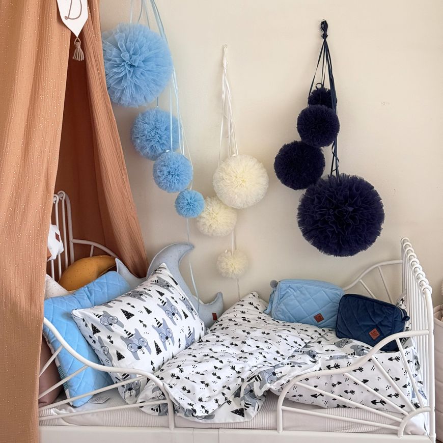 Navy pom pom pillow shop