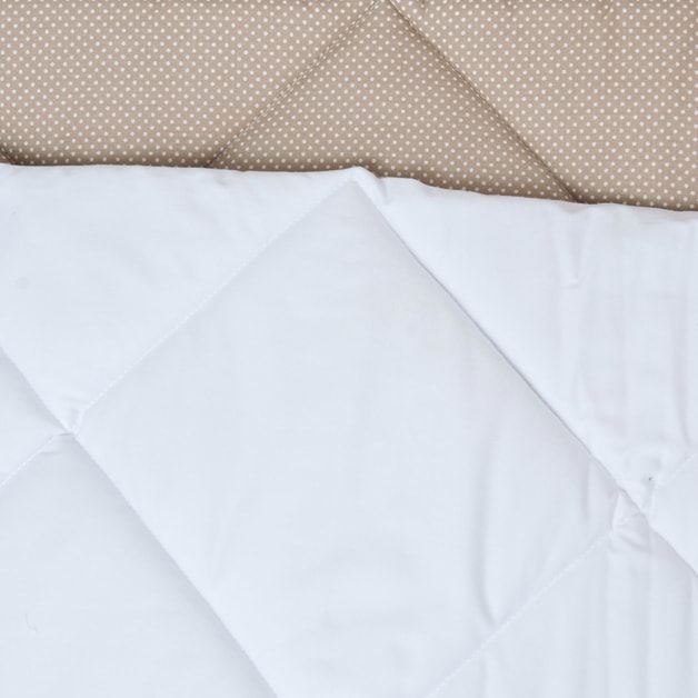 white teepee with mat